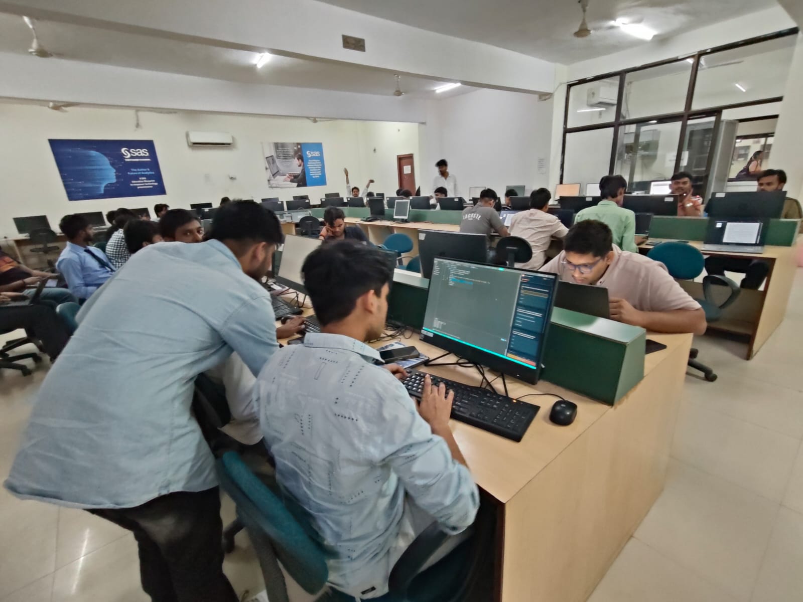 Students learning together in a Kodin based computer lab